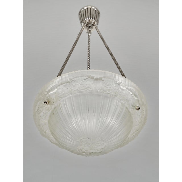 Georges Leleu A rare 1925-35 French art deco chandelier by the famous Paris based company of Georges Leleu. He founded the...