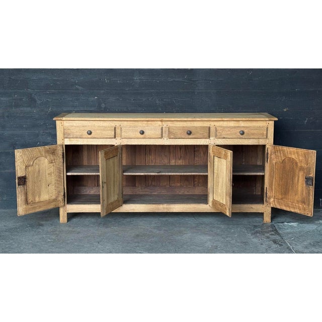 A lovely French Oak Enfilade or Sideboard. Dating to around 1900 and of excellent quality construction. 4 doors with 4...