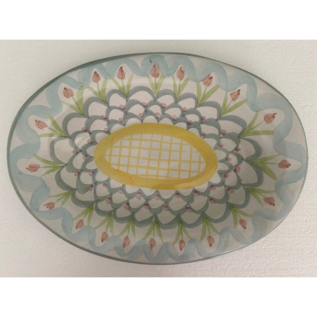 Offering a fun, hand made & hand painted oval platter from MacKenzie-Childs, Ltd. This sought after, retired collectable...