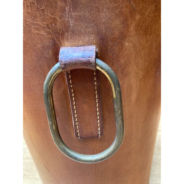 Beautiful cognac-colored leather mid-century wastebasket attributed to Carl Auböck. There are no labels or maker’s mark on...
