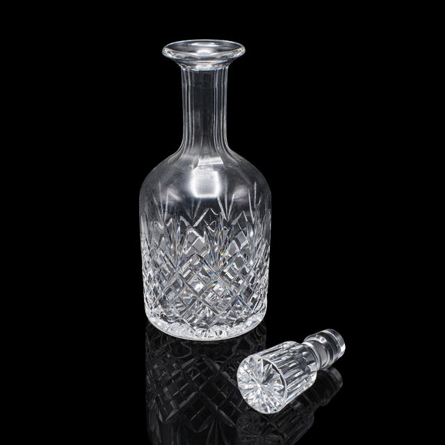 This is a vintage Sherry decanter. An English, cut glass spirit bottle, dating to the late 20th century, circa 1975. A...