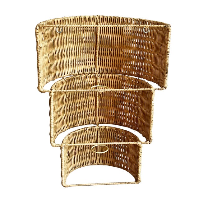 Natural hand crafted wicker wall sconce with modern tiered design. Includes spaces for two bulbs in the back. Does not...