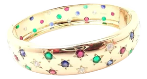 1990s Cartier Star Diamond Ruby Emerald Sapphire Yellow Gold Bangle Bracelet