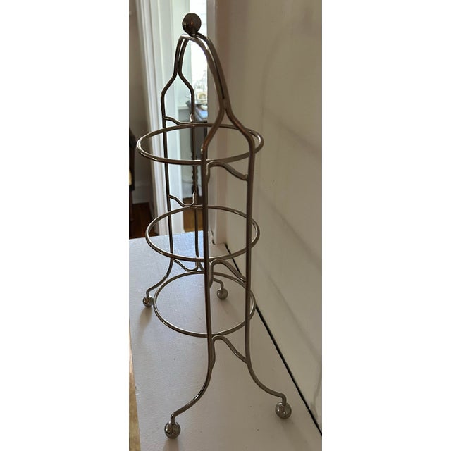 Art Nouveau Three-Tier Plate Stand – 17.5” Tall A striking Art Nouveau–style plate stand featuring elegant, curling...