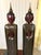 A vintage pair of extra tall, wooden, standing Buddha statues—send a message of peace, tranquility and spirituality at the...