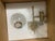 Floor sample, unused pair of Visual Comfort Turenne Sconces in hand rubbed antique brass with clear glass globe. The pair...