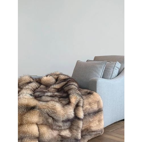 Handcrafted fox fur throw, produced in 2012 by the Irish furriers J.M. Barnardo & Son. The throw/blanket is composed of...