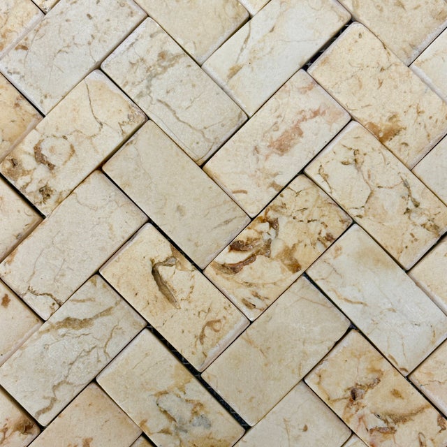 Honed ivory white marble 1" x 2" dimensional herringbone decorative mosaic tile. Suitable for use in vertical...