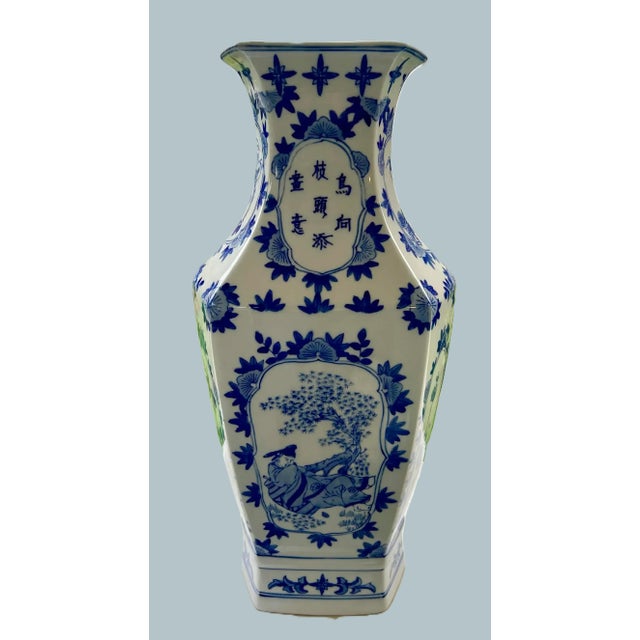 Tall Hexagonal Chinese Porcelain Vase with Blue Floral Motif, c. Late 20th Century A commanding 18-inch porcelain vase...