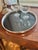 This is a vintage Crescent Silverware serving tray featuring a silverplated pierced gallery, rounded rim and petite ball...