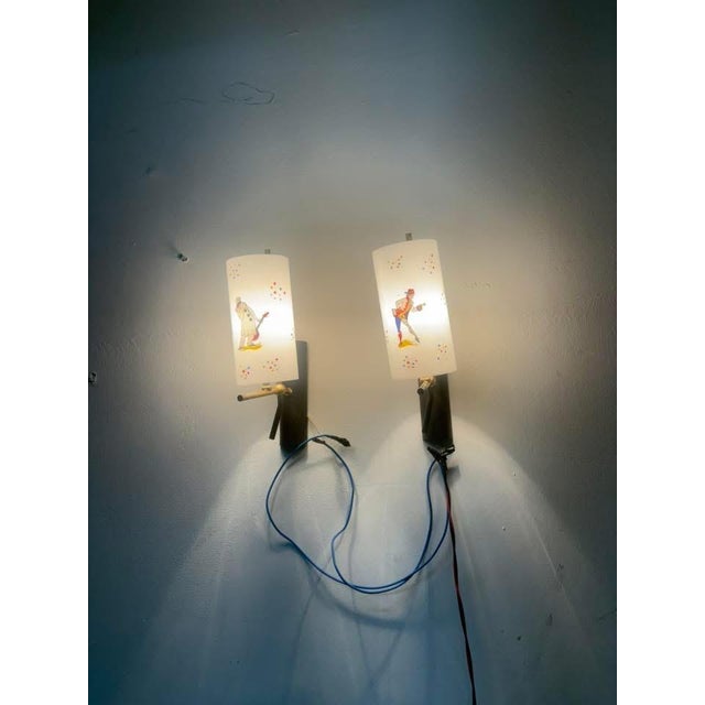 Pair of glass wall lamps with Pulcinella and Harlequin, 1950s, height 24 cm, depth 16 cm, width 8 cm, glass height 16 cm...