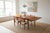 Teak dining table designed by Brdr. Furbo Spottrup in Denmark. The dining table has sturdy extendable leaves that are...