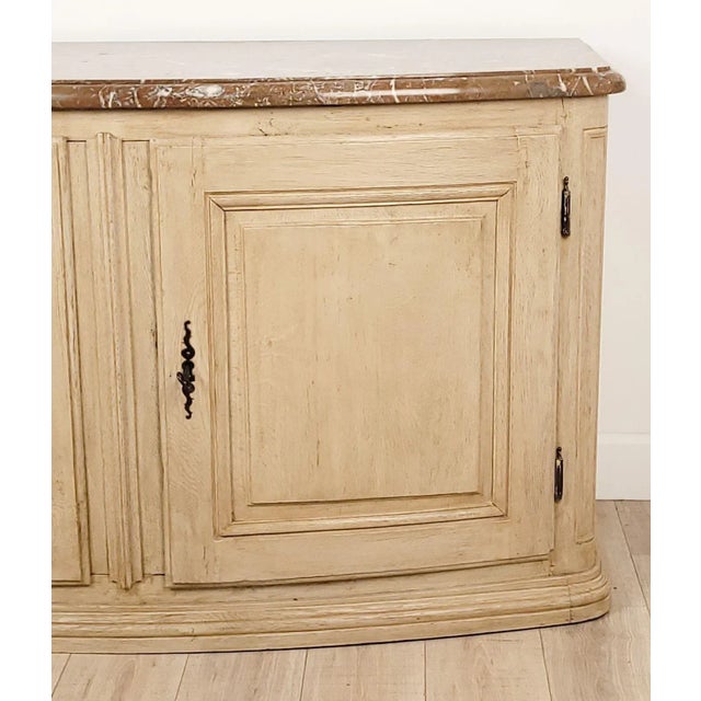 A Louis XIV painted and marble-top cabinet or server, France circa 1750.