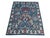 Bold large-scale floral design in the Sultanabad Mahal manner — oversized palmettes, split-leaf arabesques and curling...