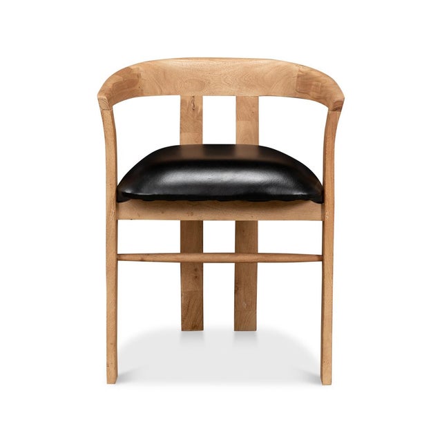 Constructed from solid hardwood, this chair boasts a natural wood finish that showcases its stylish design. The seat pad,...
