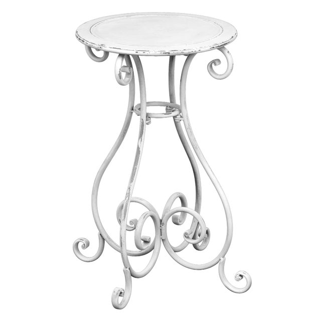 A Pair of Vintage Metal Garden Pedestals 0r tables. I see them utilized to have a tall plant in a pot raised off the...