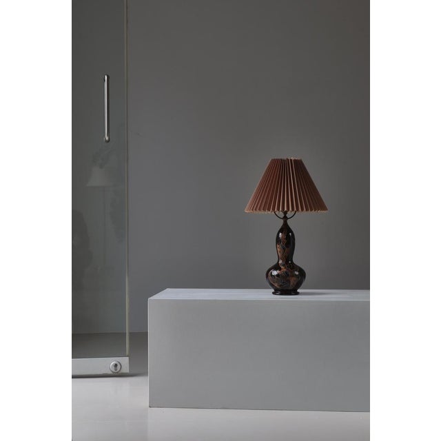 Beautiful handmade table lamp made in denmark between 1910-1920 at "møller & bøgely" workshop. The lamp base is made from...