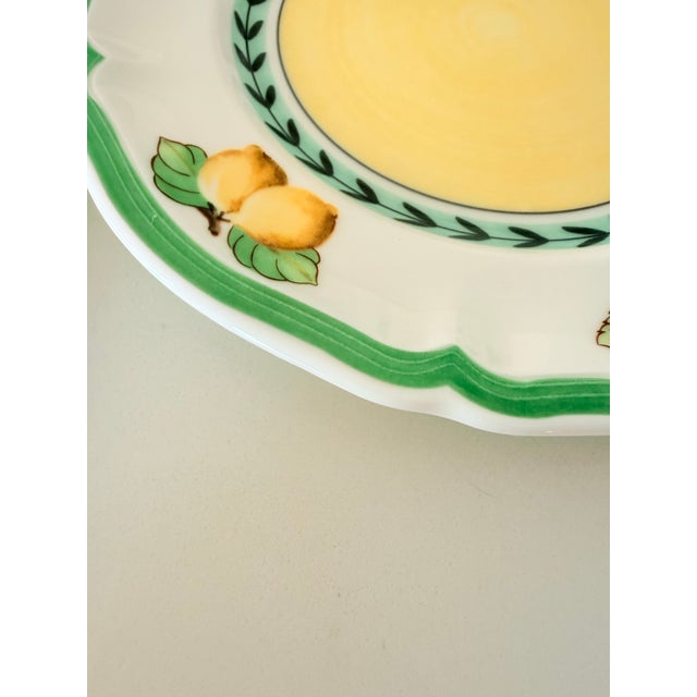 This set of 4 Villeroy & Boch French Garden plates feature a charming country house style with pale yellow center and...
