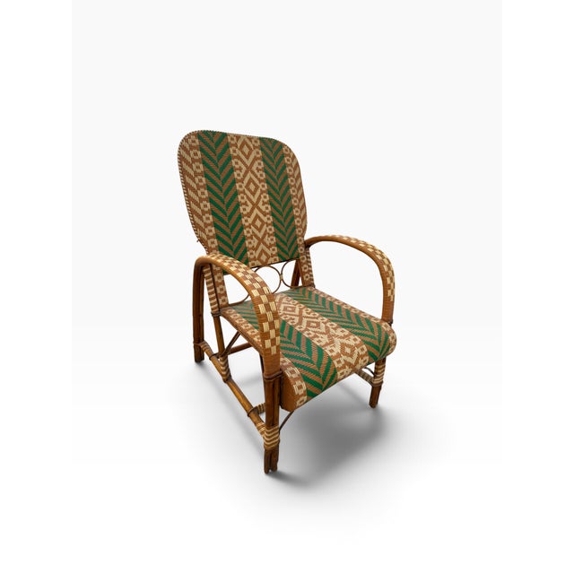 Pair of armchairs in dyed and polychrome braided rattan, not plastic lacing. This is a French artisanal technique from the...