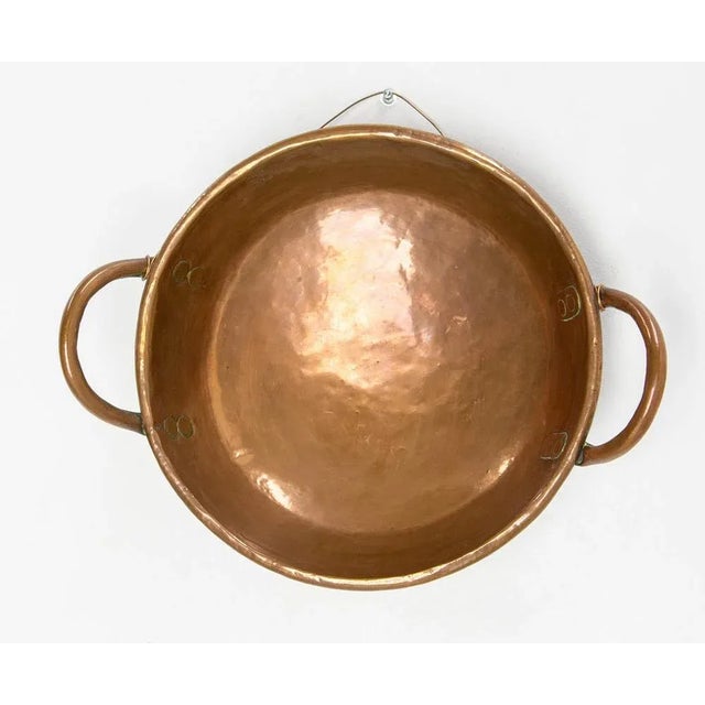 Copper center piece or old dish used in bourgeois houses. This also can be used as a wall decoration. However, if you only...
