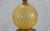 This Italian Murano table lamp combines a ribbed globe of luminous gold glass with a finely carved giltwood stem and base,...