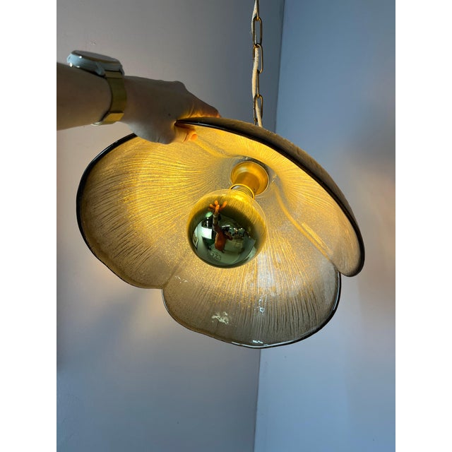 with the sculptural appeal of an organic sculpture, this pendant lamp by Peill & Putzler embodies German glass...