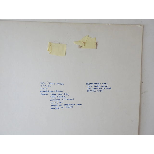 Vintage 1982 black and white photograph of abstract view of a skyscraper. Signed Dominic Isaac and dated on verso....