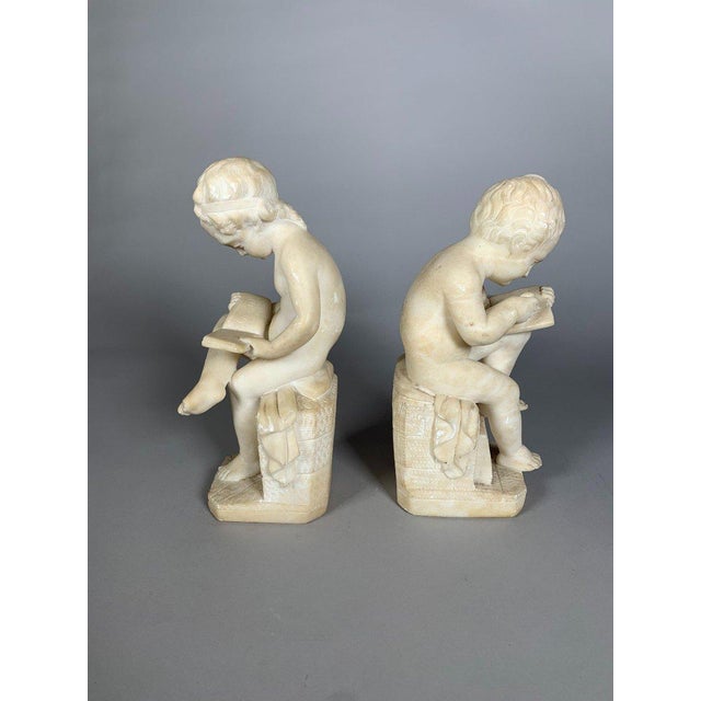 Stone Two 19th Century Marble Sculptures: The Child Scribe and The Reader, After Lemire For Sale - Image 7 of 11