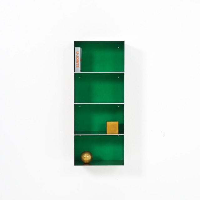 This wall cabinet was developed and made by Atelier Belge. Besides the well-crafted raw aluminum, this piece features a...
