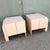 Striking pair of vintage nightstands or side cabinets featuring a soft blush pink laminate finish and sculptural Art Deco...