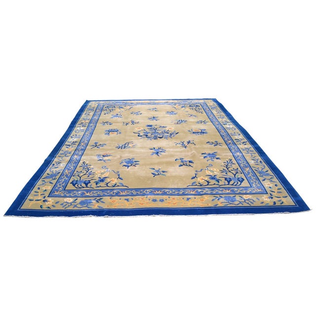 Hand-knotted with care using traditional rug-making techniques, this wool rug blends timeless craftsmanship with a modern...