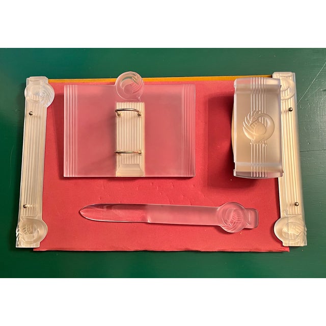 Rare desk set in crystal and brass, with high relief swans on corners, Desk set created by René Lalique includes a desk...