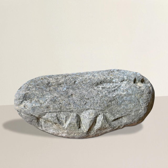 This wonderfully strange boulder—carved into the unmistakable form of a dragon’s head—is equal parts folk art, artifact,...