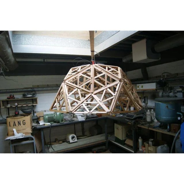 Geodesic pendant light, half globe by paul heijnen (2013) dimensions: h 70 x l 140 x w 140 cm materials: red cedar...