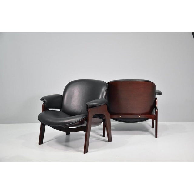 Armchairs by Ico Parisi in wood and leather for MIM Roma, 1960s. This piece is attributed to the mentioned designer/maker....