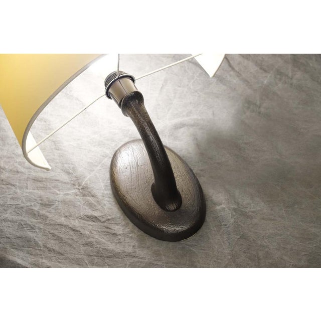 Hambled bronze structure, linen screen with hand-sewn cotton edge. This piece is attributed to the mentioned...