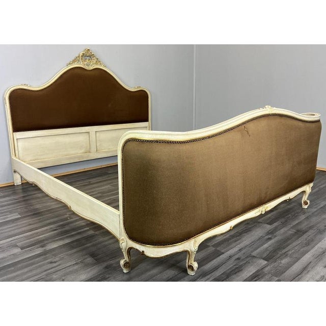 This striking Vintage French shabby chic style bed frame features an elegant upholstered headboard and footboard, a softly...