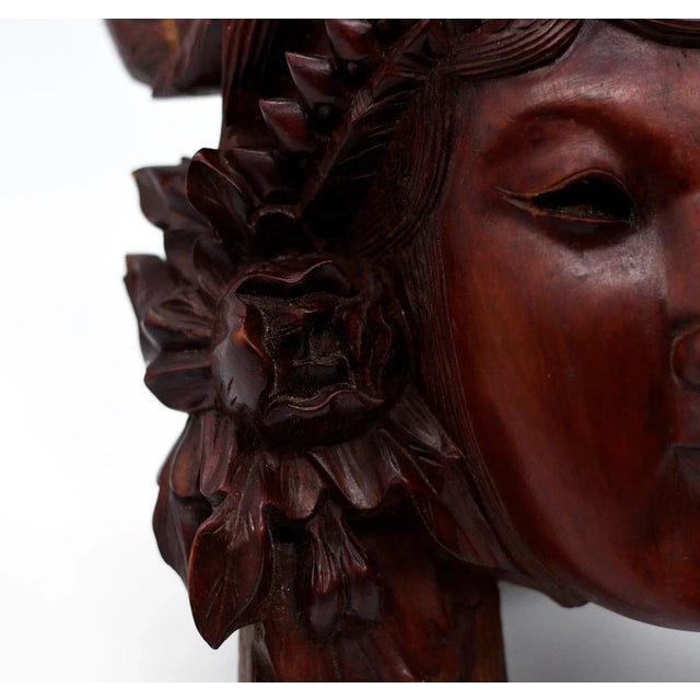 Wonderful hand-carved wooden mask or wall hanging. Beautifully detailed and an amazing addition to your collection or...