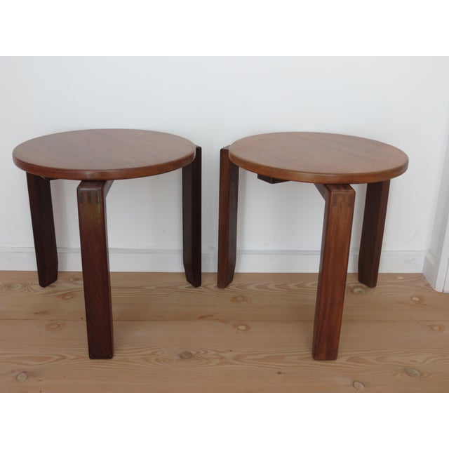 A very good quality small circular side table from the 1960s. Solid teak tops and legs with wonderful finger joint detail...
