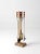 A vintage Hollywood Regency fireplace tool set dating to the 1960s, crafted in a sophisticated mix of polished brass and...