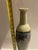Elevate your home decor with this striking, vintage-inspired studio art pottery bottle vase. Standing tall with an...