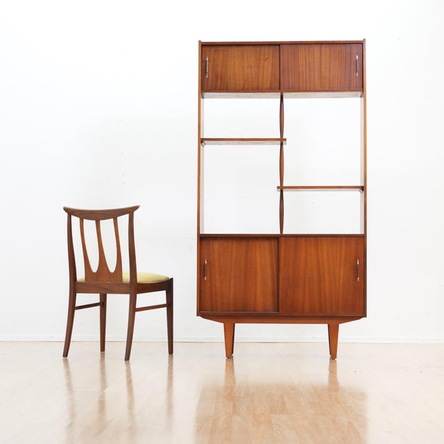 This elegant mid-century room Diver/bookcase&nbsp; combines clean architectural lines with practical storage, making it a...