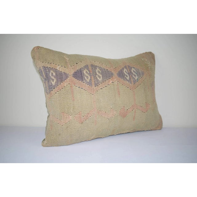This handwoven kilim pillow is made from Anatolia and Middleast Kilim fragments. Each of our kilim pillow cover is cut...