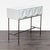 The modern drawer fronts are made from powder-coated brushed metal in a parchment finish and sit atop antique brass-...