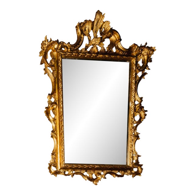 A Rococo Giltwood Mirror 20th Century Bordered in C-Scrolls and Rocaille. For Sale