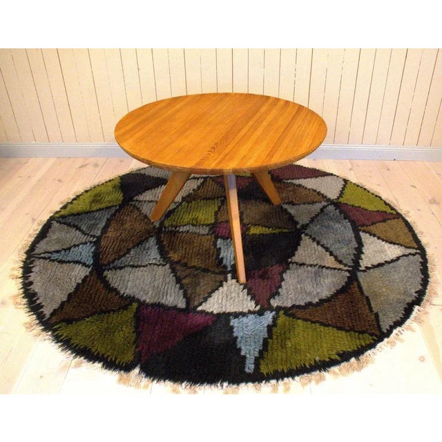 A rare coffee table designed by one of the greatest 20th C Swedish designer, Carl Malmsten. This was made for Svensk Fur...