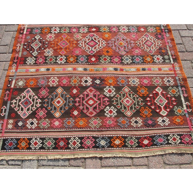 Vintage handwoven Turkish kilim rug. It is handmade of very fine quality natural wool in all colors. ready to use. The...