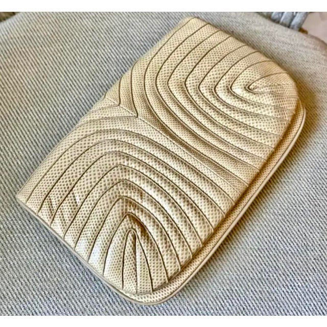 Chic 80s La Model Finesse water snake clutch with a sophisticated stitched design. Leather lined. In pristine condition....