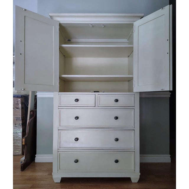 This is a beautiful door chest made by Ethan Allen in the Tango collection. It is white with a light glaze. Dimensions:...