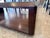 Elegant two-tier cocktail table from Bernhardt Furniture which features glass insert at top and walnut base for second...